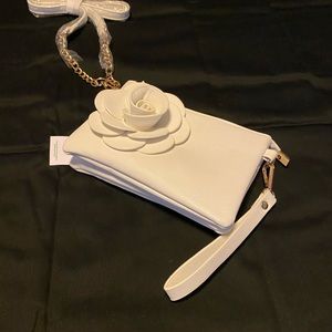 Crossbody and corner zip wristlet purse